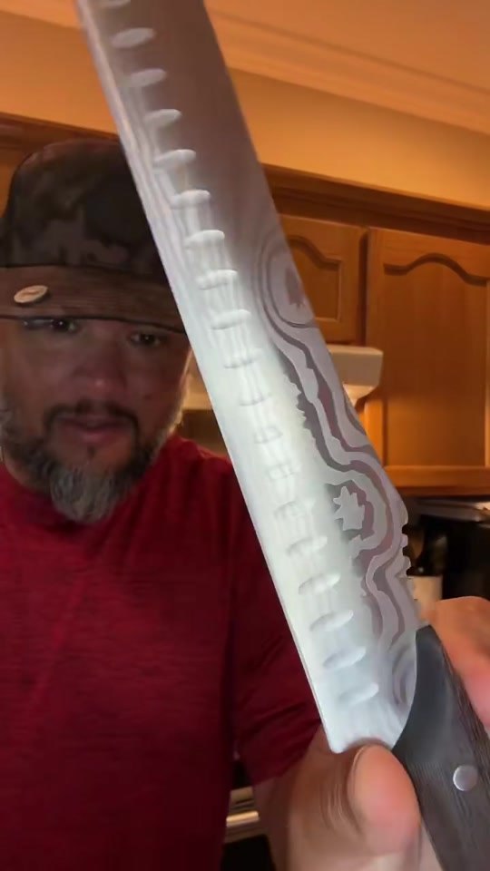 @timberfindz demonstrating 12-inch Carving Knife